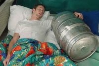 guyasleepwithbeerbarrel.jpg